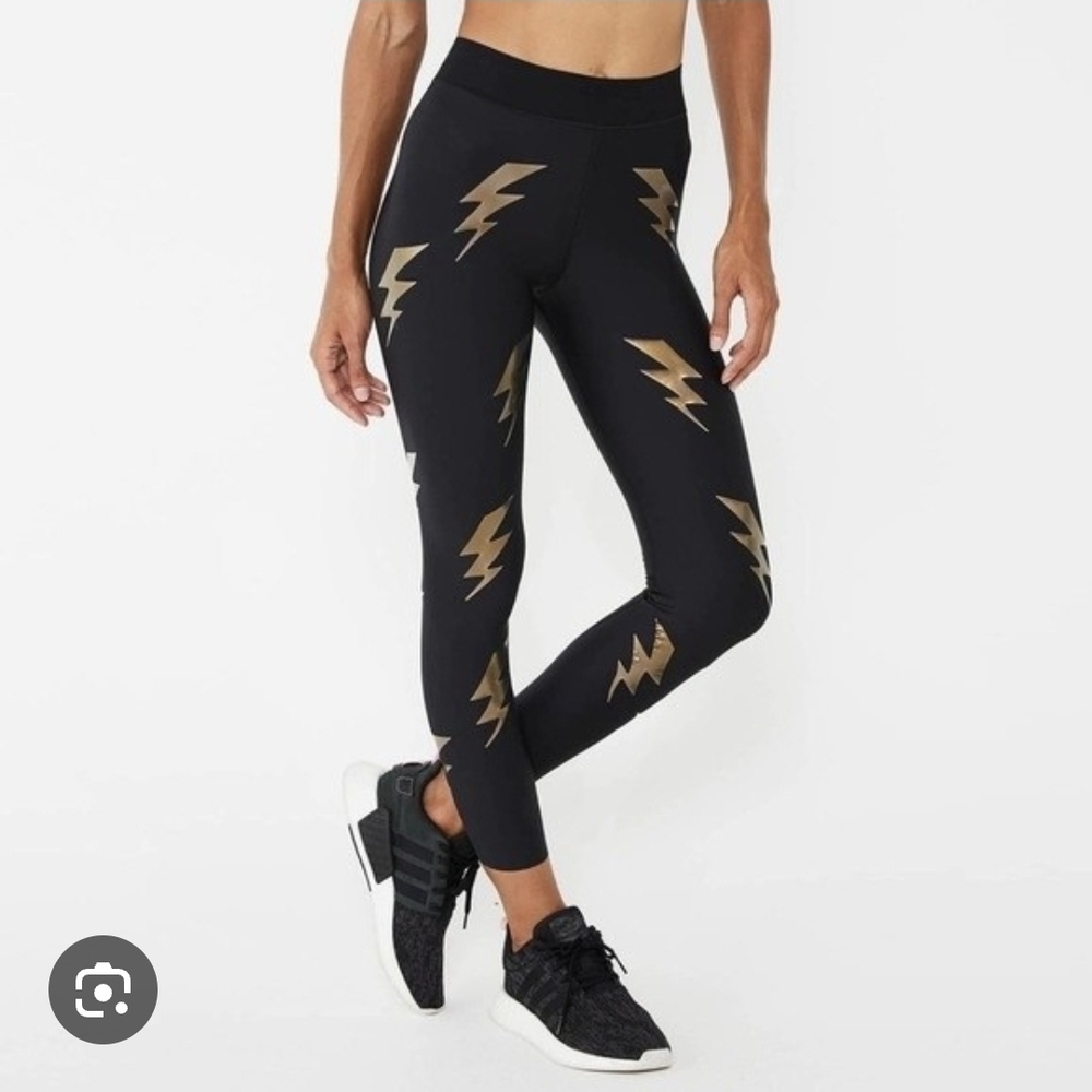 Ultracor Black Leggings with Gold Lightning Design